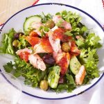 Salmon and olive salad with spicy tomato dressing