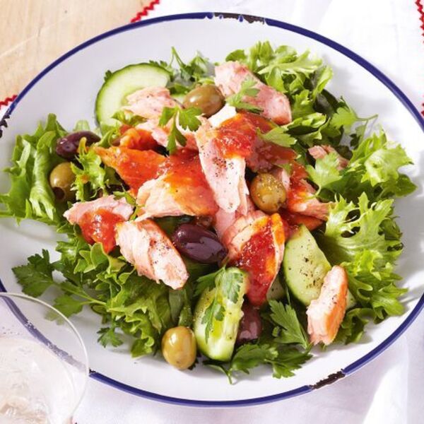 Salmon and olive salad with spicy tomato dressing