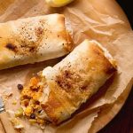 Spicy parcels with herb salad