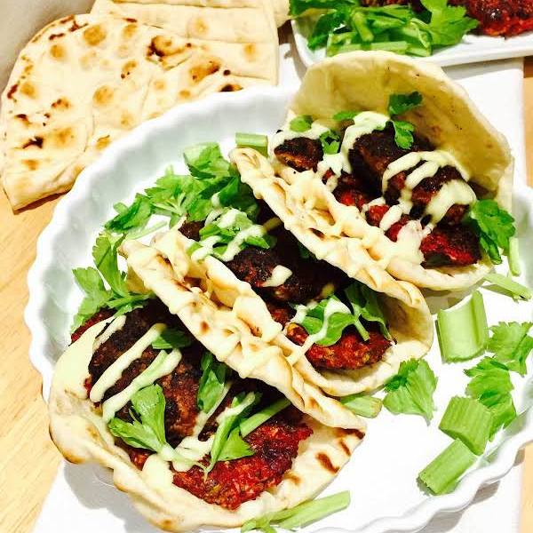 Beetroot and Halloumi cheese burgers on flat bread