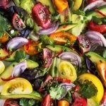 Isle of Wight tomato, avocado and red onion salad with lime and chilli dressing