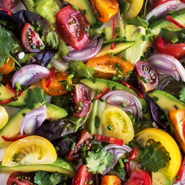 Isle of Wight tomato, avocado and red onion salad with lime and chilli dressing