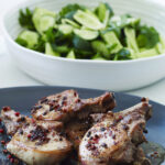 Pork cutlets with pink peppercorns and cucumber salad