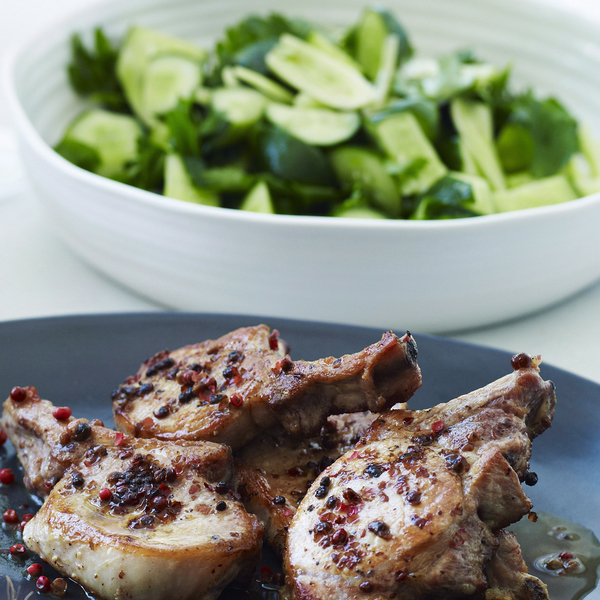 Pork cutlets with pink peppercorns and cucumber salad