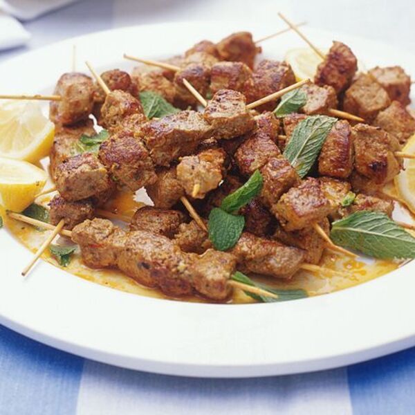 Pinchitos (little pork skewers) with parsley & almond salad